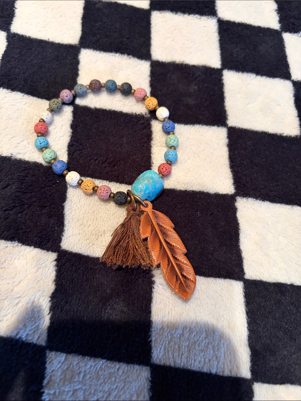 Multicolor Beaded Bracelet with Brown Tassel & Leaf Charm